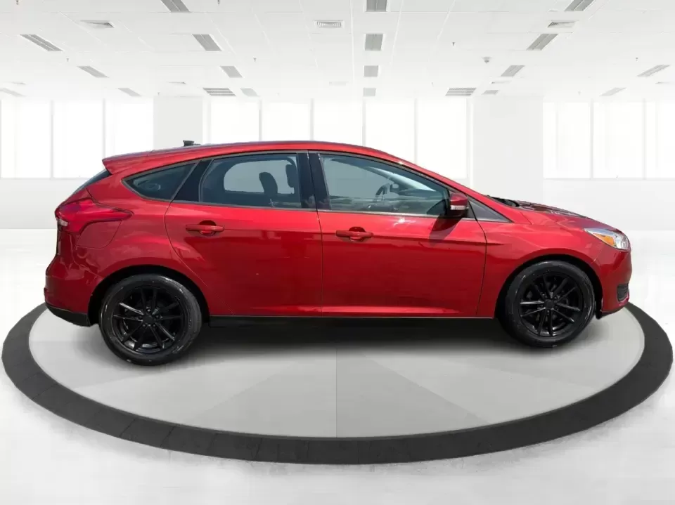 2018 Ford Focus SE (1FADP3K27JL) with an 2L I-4 gasoline direct injection engine, Automatic transmission, located at 4508 South Dixie Dr, Moraine, OH, 45439, (937) 908-9800, 39.689976, -84.218452 - Need a practical, fun-to-drive hatchback for the daily commute down South Dixie Drive, quick errands near Dayton Mall, or an easy weekend escape to Carillon Historical Park? This 2018 Ford Focus SE in eye-catching Hot Pepper Red Metallic Tinted Clearcoat fits real life in Moraine, Ohio-compact enoug- Photo#1