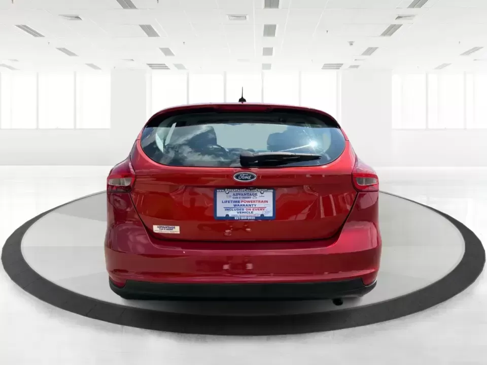 2018 Ford Focus SE (1FADP3K27JL) with an 2L I-4 gasoline direct injection engine, Automatic transmission, located at 4508 South Dixie Dr, Moraine, OH, 45439, (937) 908-9800, 39.689976, -84.218452 - Need a practical, fun-to-drive hatchback for the daily commute down South Dixie Drive, quick errands near Dayton Mall, or an easy weekend escape to Carillon Historical Park? This 2018 Ford Focus SE in eye-catching Hot Pepper Red Metallic Tinted Clearcoat fits real life in Moraine, Ohio-compact enoug- Photo#3