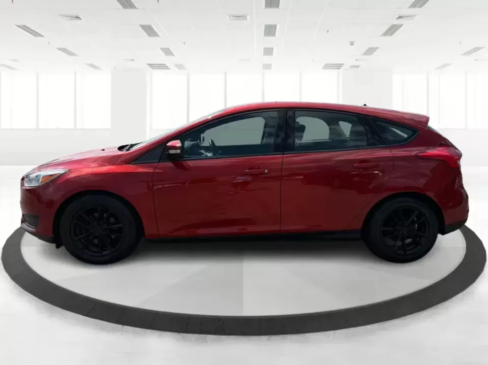 2018 Ford Focus SE (1FADP3K27JL) with an 2L I-4 gasoline direct injection engine, Automatic transmission, located at 4508 South Dixie Dr, Moraine, OH, 45439, (937) 908-9800, 39.689976, -84.218452 - Need a practical, fun-to-drive hatchback for the daily commute down South Dixie Drive, quick errands near Dayton Mall, or an easy weekend escape to Carillon Historical Park? This 2018 Ford Focus SE in eye-catching Hot Pepper Red Metallic Tinted Clearcoat fits real life in Moraine, Ohio-compact enoug- Photo#5