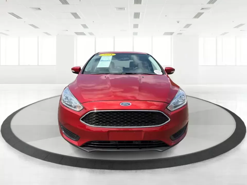 2018 Ford Focus SE (1FADP3K27JL) with an 2L I-4 gasoline direct injection engine, Automatic transmission, located at 4508 South Dixie Dr, Moraine, OH, 45439, (937) 908-9800, 39.689976, -84.218452 - Need a practical, fun-to-drive hatchback for the daily commute down South Dixie Drive, quick errands near Dayton Mall, or an easy weekend escape to Carillon Historical Park? This 2018 Ford Focus SE in eye-catching Hot Pepper Red Metallic Tinted Clearcoat fits real life in Moraine, Ohio-compact enoug- Photo#7