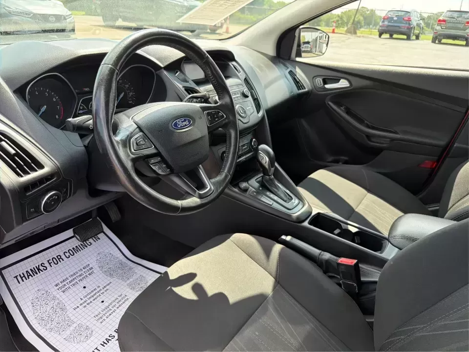 2018 Ford Focus SE (1FADP3K27JL) with an 2L I-4 gasoline direct injection engine, Automatic transmission, located at 4508 South Dixie Dr, Moraine, OH, 45439, (937) 908-9800, 39.689976, -84.218452 - Need a practical, fun-to-drive hatchback for the daily commute down South Dixie Drive, quick errands near Dayton Mall, or an easy weekend escape to Carillon Historical Park? This 2018 Ford Focus SE in eye-catching Hot Pepper Red Metallic Tinted Clearcoat fits real life in Moraine, Ohio-compact enoug- Photo#9