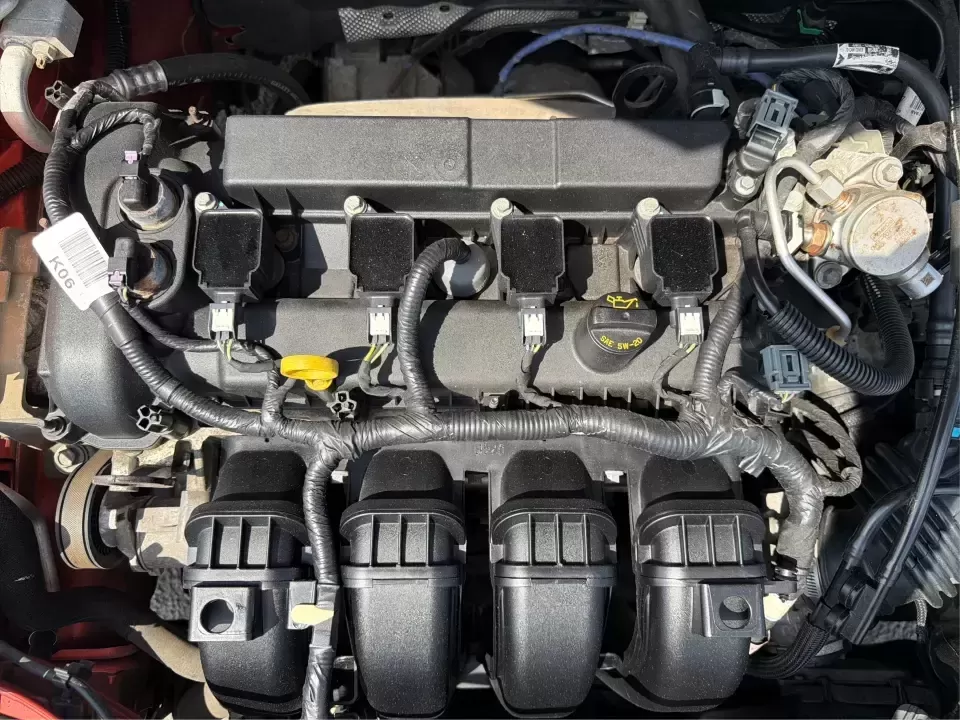 2018 Ford Focus SE (1FADP3K27JL) with an 2L I-4 gasoline direct injection engine, Automatic transmission, located at 4508 South Dixie Dr, Moraine, OH, 45439, (937) 908-9800, 39.689976, -84.218452 - Need a practical, fun-to-drive hatchback for the daily commute down South Dixie Drive, quick errands near Dayton Mall, or an easy weekend escape to Carillon Historical Park? This 2018 Ford Focus SE in eye-catching Hot Pepper Red Metallic Tinted Clearcoat fits real life in Moraine, Ohio-compact enoug- Photo#11