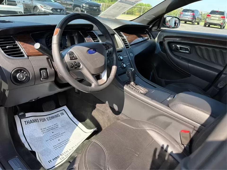 2015 Ford Taurus Limited (1FAHP2F89FG) with an EcoBoost 2L I-4 gasoline direct injection engine, located at 880 E. National Road, Vandalia, OH, 45377, (937) 908-9800, 39.891918, -84.183594 - Need a comfortable, feature-packed sedan for the daily commute up I75, quick school drop-offs, or a relaxed weekend drive to the National Museum of the U.S. Air Force? This 2015 Ford Taurus Limited in Ingot Silver Metallic delivers a big-car ride with upscale amenities and confident power-an ideal f- Photo#9