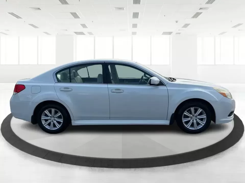 2011 Subaru Legacy Premium + CWP (4S3BMBC69B3) with an 2.5L H-4 variable valve control engine, Continuously Variable Transmission (CVT) transmission, located at 8750 N County Rd 25A, Piqua, OH, 45356, (937) 908-9800, 40.164391, -84.232513 - Need a confident, all-weather commuter that can handle Ohio winters, weekend road trips, and the daily school-and-work shuffle without feeling like a bare-bones sedan? This 2011 Subaru Legacy Premium + CWP in Satin White Pearl is a smart fit for drivers who want Subaru capability in a comfortable, p- Photo#1