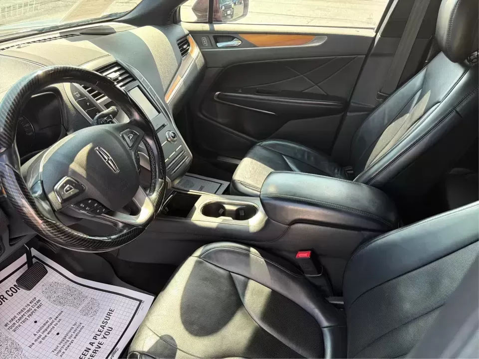 2017 Lincoln MKC Reserve AWD (5LMTJ3DH5HU) with an 2.3L L4 DOHC 16V engine, 6-Speed Automatic transmission, located at 8750 N County Rd 25A, Piqua, OH, 45356, (937) 908-9800, 40.164391, -84.232513 - Need a comfortable, upscale SUV that can handle Ohio weather, school drop-offs, and weekend getaways without feeling like a chore? This 2017 Lincoln MKC Reserve AWD in Ruby Red Metallic Tinted Clearcoat is a smart fit for commuters, growing families, and anyone who wants premium features for daily l- Photo#9