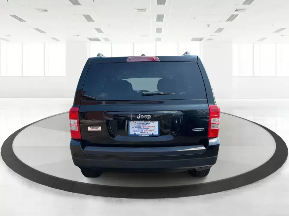 2014 Jeep Patriot Latitude 2WD (1C4NJPFA2ED) with an 2.0L L4 DOHC 16V engine, located at 8750 N County Rd 25A, Piqua, OH, 45356, (937) 908-9800, 40.164391, -84.232513 - Need a practical SUV for school runs, daily commutes to Troy or Dayton, and spontaneous weekend getaways without stretching the budget? This **2014 Jeep Patriot Latitude 2WD** is a smart, flexible choice for drivers who want SUV space, easy-to-live-with comfort, and a straightforward ownership exper- Photo#3