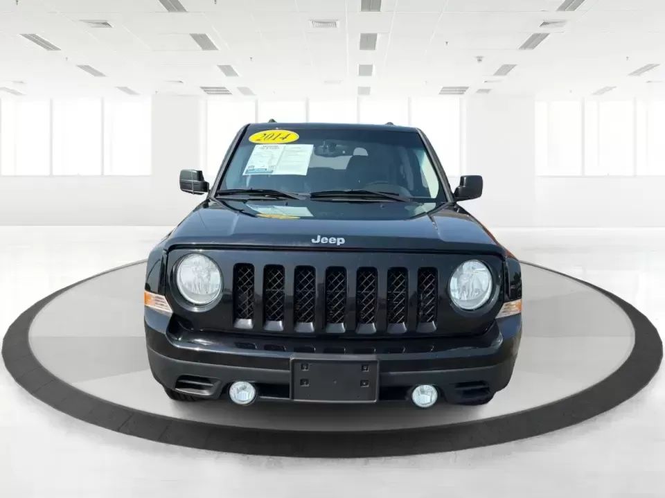 2014 Jeep Patriot Latitude 2WD (1C4NJPFA2ED) with an 2.0L L4 DOHC 16V engine, located at 8750 N County Rd 25A, Piqua, OH, 45356, (937) 908-9800, 40.164391, -84.232513 - Need a practical SUV for school runs, daily commutes to Troy or Dayton, and spontaneous weekend getaways without stretching the budget? This **2014 Jeep Patriot Latitude 2WD** is a smart, flexible choice for drivers who want SUV space, easy-to-live-with comfort, and a straightforward ownership exper- Photo#7