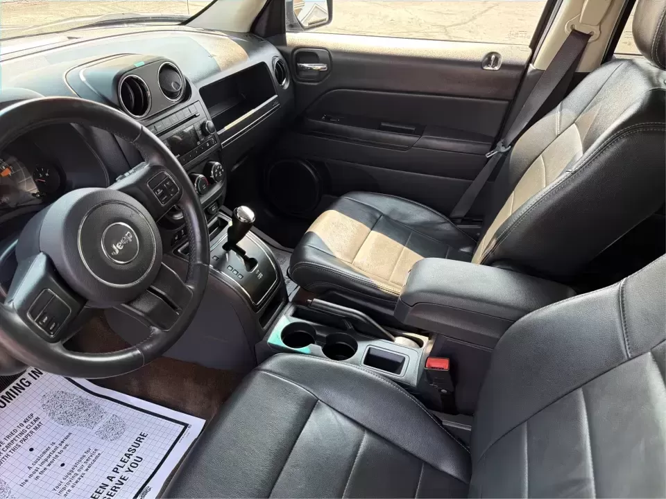 2014 Jeep Patriot Latitude 2WD (1C4NJPFA2ED) with an 2.0L L4 DOHC 16V engine, located at 8750 N County Rd 25A, Piqua, OH, 45356, (937) 908-9800, 40.164391, -84.232513 - Need a practical SUV for school runs, daily commutes to Troy or Dayton, and spontaneous weekend getaways without stretching the budget? This **2014 Jeep Patriot Latitude 2WD** is a smart, flexible choice for drivers who want SUV space, easy-to-live-with comfort, and a straightforward ownership exper- Photo#9