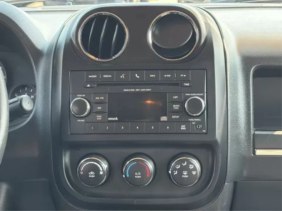 2014 Jeep Patriot Latitude 2WD (1C4NJPFA2ED) with an 2.0L L4 DOHC 16V engine, located at 8750 N County Rd 25A, Piqua, OH, 45356, (937) 908-9800, 40.164391, -84.232513 - Need a practical SUV for school runs, daily commutes to Troy or Dayton, and spontaneous weekend getaways without stretching the budget? This **2014 Jeep Patriot Latitude 2WD** is a smart, flexible choice for drivers who want SUV space, easy-to-live-with comfort, and a straightforward ownership exper- Photo#13