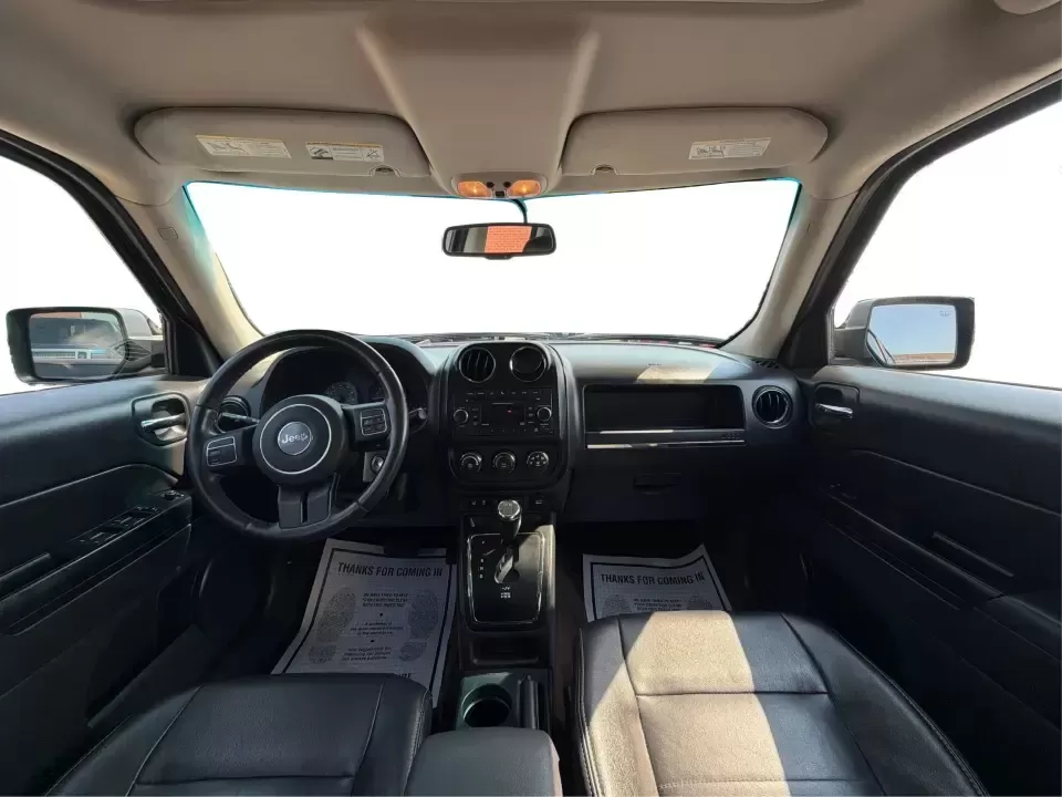 2014 Jeep Patriot Latitude 2WD (1C4NJPFA2ED) with an 2.0L L4 DOHC 16V engine, located at 8750 N County Rd 25A, Piqua, OH, 45356, (937) 908-9800, 40.164391, -84.232513 - Need a practical SUV for school runs, daily commutes to Troy or Dayton, and spontaneous weekend getaways without stretching the budget? This **2014 Jeep Patriot Latitude 2WD** is a smart, flexible choice for drivers who want SUV space, easy-to-live-with comfort, and a straightforward ownership exper- Photo#21