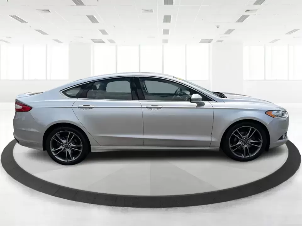 2014 Ford Fusion Titanium AWD (3FA6P0D98ER) with an 2.0L L4 DOHC 16V engine, located at 1099 N County Rd 25A , Troy, OH, 45373, (937) 908-9800, 40.057079, -84.212883 - Need a smart, comfortable sedan that can handle Ohio's changing weather for daily commuting, school drop-offs, and weekend getaways? This 2014 Ford Fusion Titanium AWD is built for real life in and around Troy-whether you're cruising down I75 to Dayton, heading across town on N County Rd 25A, or pla- Photo#1