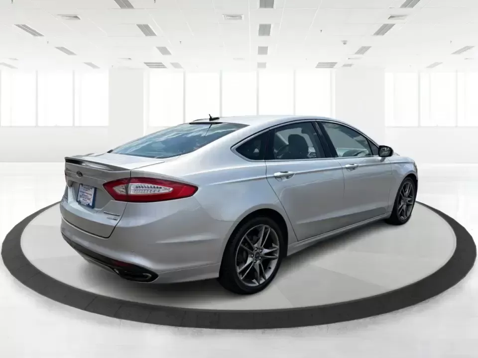 2014 Ford Fusion Titanium AWD (3FA6P0D98ER) with an 2.0L L4 DOHC 16V engine, located at 1099 N County Rd 25A , Troy, OH, 45373, (937) 908-9800, 40.057079, -84.212883 - Need a smart, comfortable sedan that can handle Ohio's changing weather for daily commuting, school drop-offs, and weekend getaways? This 2014 Ford Fusion Titanium AWD is built for real life in and around Troy-whether you're cruising down I75 to Dayton, heading across town on N County Rd 25A, or pla- Photo#2