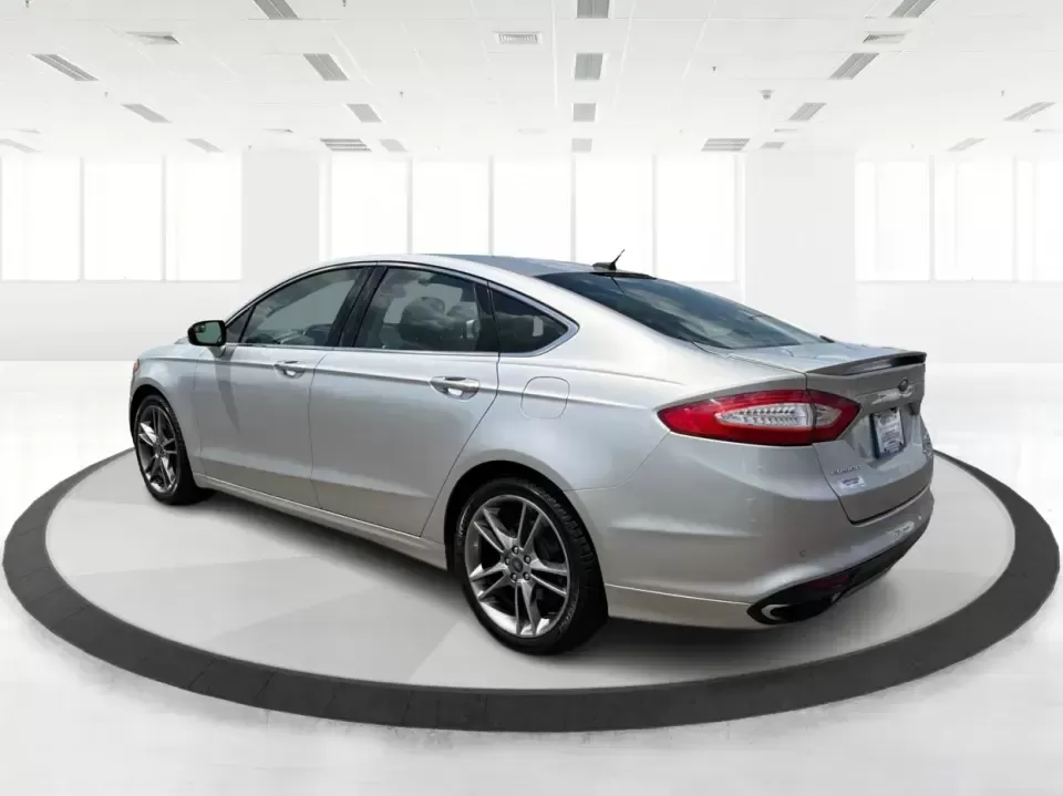 2014 Ford Fusion Titanium AWD (3FA6P0D98ER) with an 2.0L L4 DOHC 16V engine, located at 1099 N County Rd 25A , Troy, OH, 45373, (937) 908-9800, 40.057079, -84.212883 - Need a smart, comfortable sedan that can handle Ohio's changing weather for daily commuting, school drop-offs, and weekend getaways? This 2014 Ford Fusion Titanium AWD is built for real life in and around Troy-whether you're cruising down I75 to Dayton, heading across town on N County Rd 25A, or pla- Photo#4