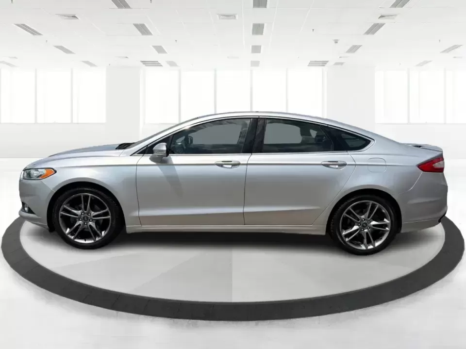 2014 Ford Fusion Titanium AWD (3FA6P0D98ER) with an 2.0L L4 DOHC 16V engine, located at 1099 N County Rd 25A , Troy, OH, 45373, (937) 908-9800, 40.057079, -84.212883 - Need a smart, comfortable sedan that can handle Ohio's changing weather for daily commuting, school drop-offs, and weekend getaways? This 2014 Ford Fusion Titanium AWD is built for real life in and around Troy-whether you're cruising down I75 to Dayton, heading across town on N County Rd 25A, or pla- Photo#5