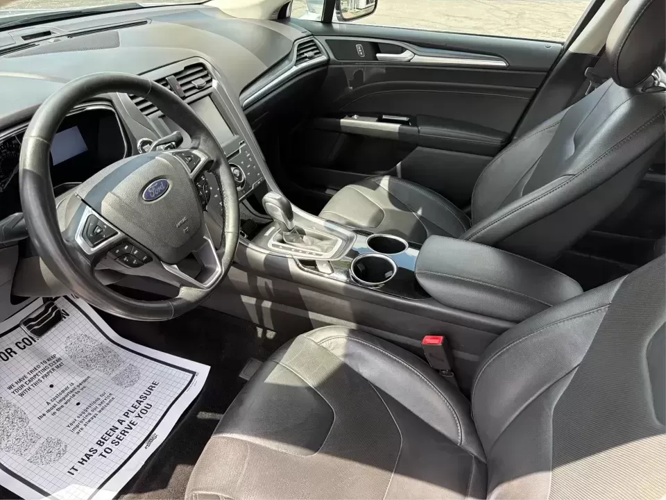 2014 Ford Fusion Titanium AWD (3FA6P0D98ER) with an 2.0L L4 DOHC 16V engine, located at 1099 N County Rd 25A , Troy, OH, 45373, (937) 908-9800, 40.057079, -84.212883 - Need a smart, comfortable sedan that can handle Ohio's changing weather for daily commuting, school drop-offs, and weekend getaways? This 2014 Ford Fusion Titanium AWD is built for real life in and around Troy-whether you're cruising down I75 to Dayton, heading across town on N County Rd 25A, or pla- Photo#9