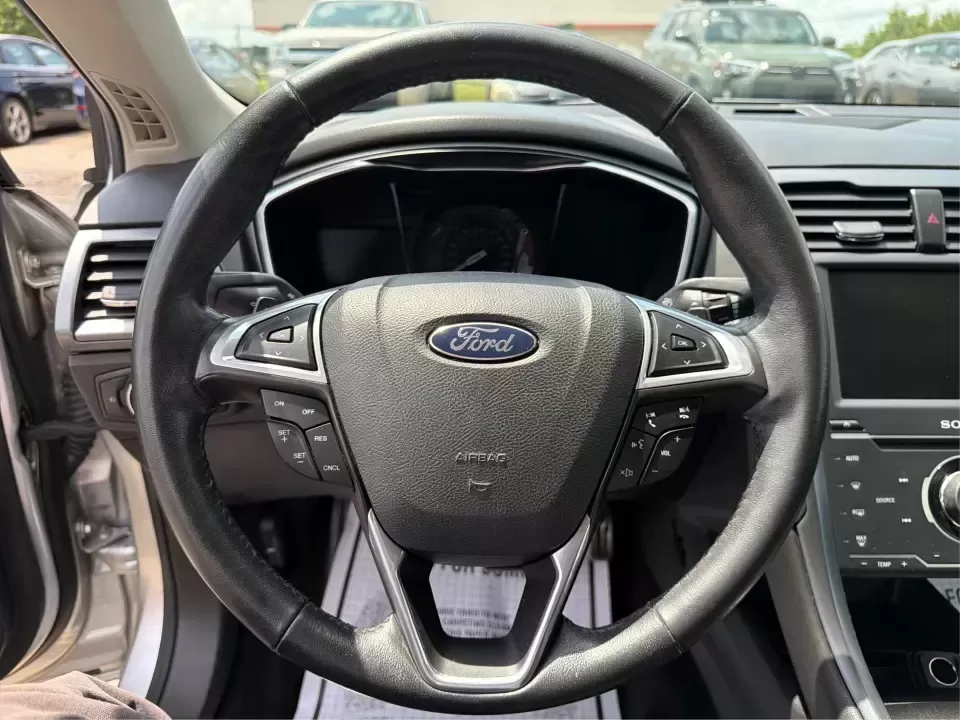 2014 Ford Fusion Titanium AWD (3FA6P0D98ER) with an 2.0L L4 DOHC 16V engine, located at 1099 N County Rd 25A , Troy, OH, 45373, (937) 908-9800, 40.057079, -84.212883 - Need a smart, comfortable sedan that can handle Ohio's changing weather for daily commuting, school drop-offs, and weekend getaways? This 2014 Ford Fusion Titanium AWD is built for real life in and around Troy-whether you're cruising down I75 to Dayton, heading across town on N County Rd 25A, or pla- Photo#16