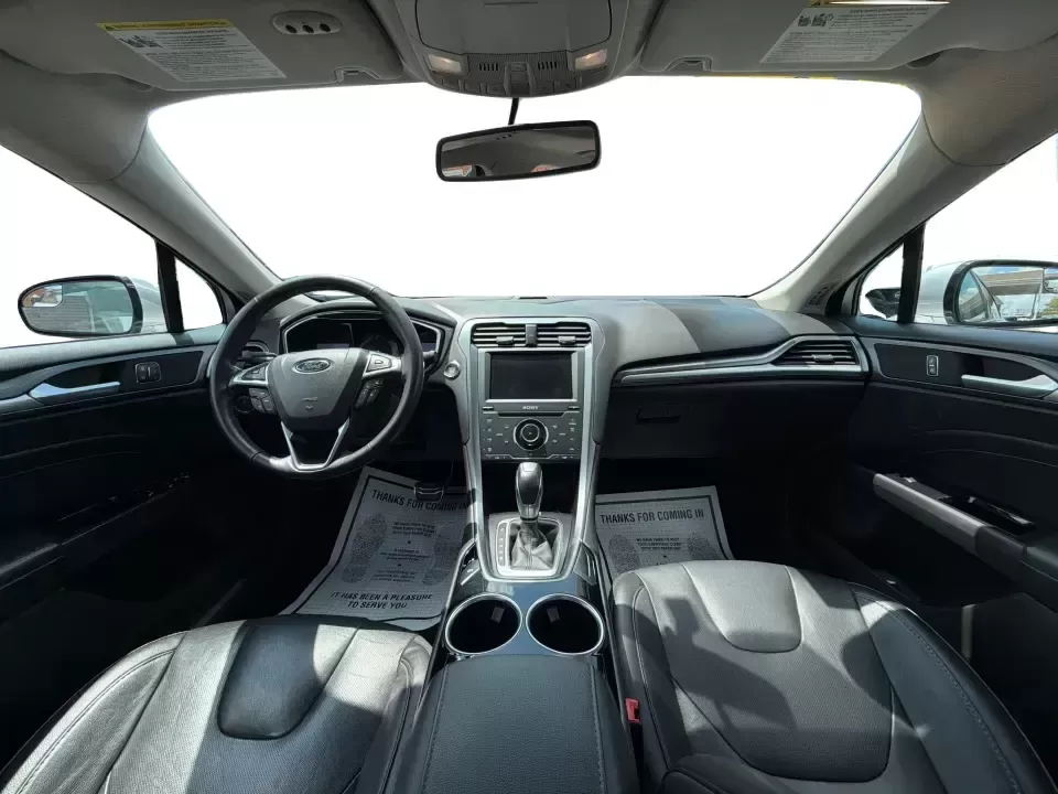 2014 Ford Fusion Titanium AWD (3FA6P0D98ER) with an 2.0L L4 DOHC 16V engine, located at 1099 N County Rd 25A , Troy, OH, 45373, (937) 908-9800, 40.057079, -84.212883 - Need a smart, comfortable sedan that can handle Ohio's changing weather for daily commuting, school drop-offs, and weekend getaways? This 2014 Ford Fusion Titanium AWD is built for real life in and around Troy-whether you're cruising down I75 to Dayton, heading across town on N County Rd 25A, or pla- Photo#21