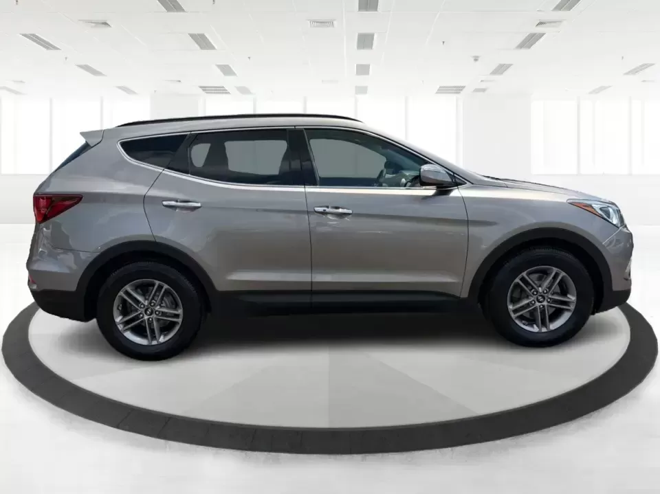 2017 Hyundai Santa Fe Sport 2.4 FWD (5XYZU3LBXHG) with an 2.4L L4 DOHC 16V engine, 6-Speed Automatic transmission, located at 1099 N County Rd 25A , Troy, OH, 45373, (937) 908-9800, 40.057079, -84.212883 - Pack the kids for school drop-off, load up groceries for the week, and still have room for a spontaneous weekend escape-this 2017 Hyundai Santa Fe Sport is built for real life in Troy, Ohio. With SUV practicality, comfortable seating, and the kind of everyday tech that makes commuting smoother, it's- Photo#1