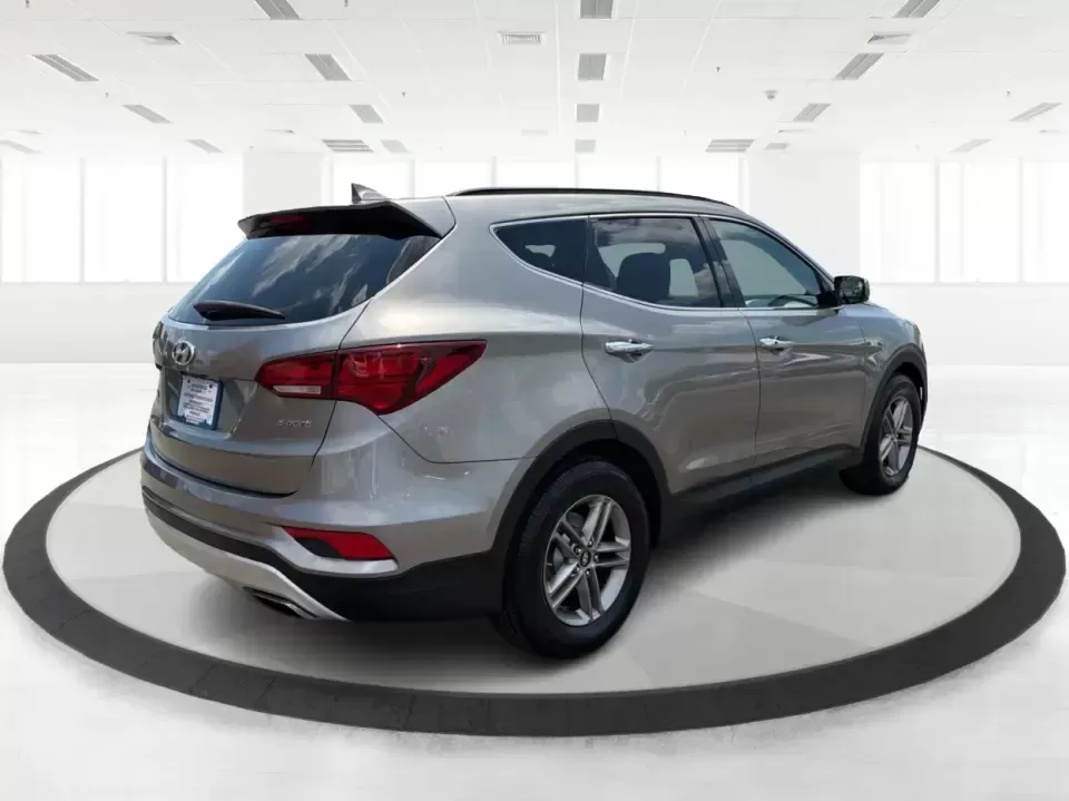 2017 Hyundai Santa Fe Sport 2.4 FWD (5XYZU3LBXHG) with an 2.4L L4 DOHC 16V engine, 6-Speed Automatic transmission, located at 1099 N County Rd 25A , Troy, OH, 45373, (937) 908-9800, 40.057079, -84.212883 - Pack the kids for school drop-off, load up groceries for the week, and still have room for a spontaneous weekend escape-this 2017 Hyundai Santa Fe Sport is built for real life in Troy, Ohio. With SUV practicality, comfortable seating, and the kind of everyday tech that makes commuting smoother, it's- Photo#2