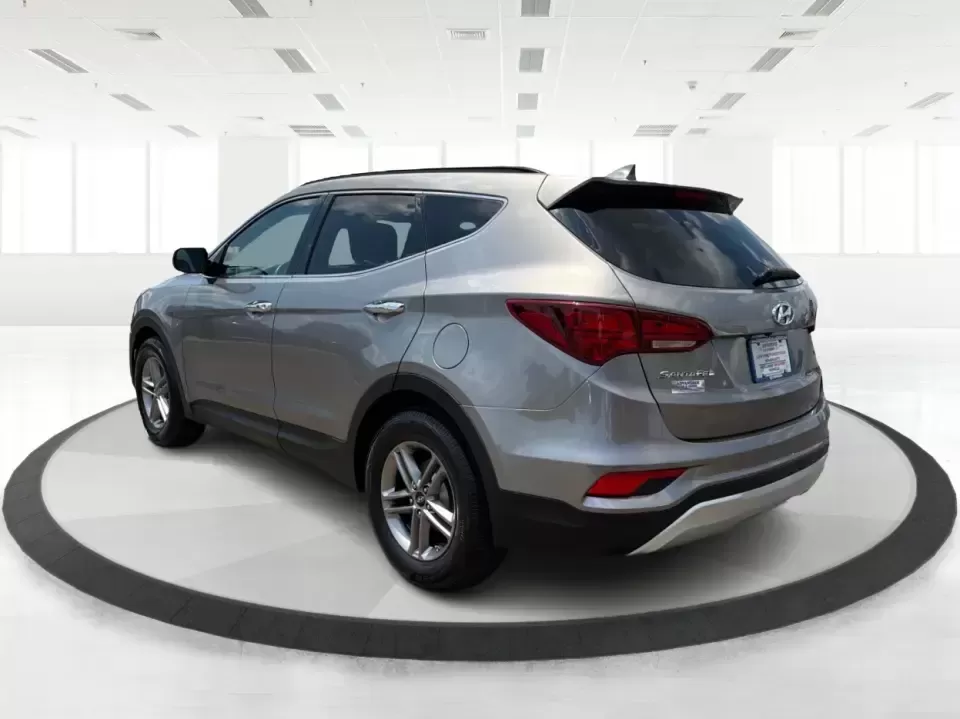 2017 Hyundai Santa Fe Sport 2.4 FWD (5XYZU3LBXHG) with an 2.4L L4 DOHC 16V engine, 6-Speed Automatic transmission, located at 1099 N County Rd 25A , Troy, OH, 45373, (937) 908-9800, 40.057079, -84.212883 - Pack the kids for school drop-off, load up groceries for the week, and still have room for a spontaneous weekend escape-this 2017 Hyundai Santa Fe Sport is built for real life in Troy, Ohio. With SUV practicality, comfortable seating, and the kind of everyday tech that makes commuting smoother, it's- Photo#4