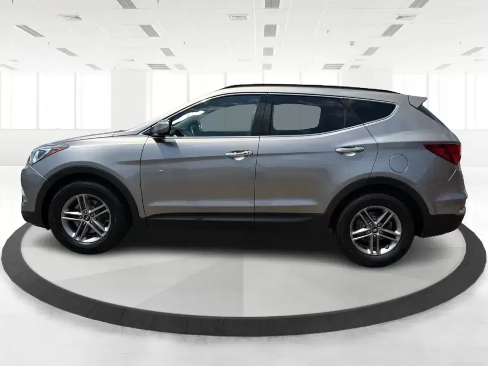 2017 Hyundai Santa Fe Sport 2.4 FWD (5XYZU3LBXHG) with an 2.4L L4 DOHC 16V engine, 6-Speed Automatic transmission, located at 1099 N County Rd 25A , Troy, OH, 45373, (937) 908-9800, 40.057079, -84.212883 - Pack the kids for school drop-off, load up groceries for the week, and still have room for a spontaneous weekend escape-this 2017 Hyundai Santa Fe Sport is built for real life in Troy, Ohio. With SUV practicality, comfortable seating, and the kind of everyday tech that makes commuting smoother, it's- Photo#5