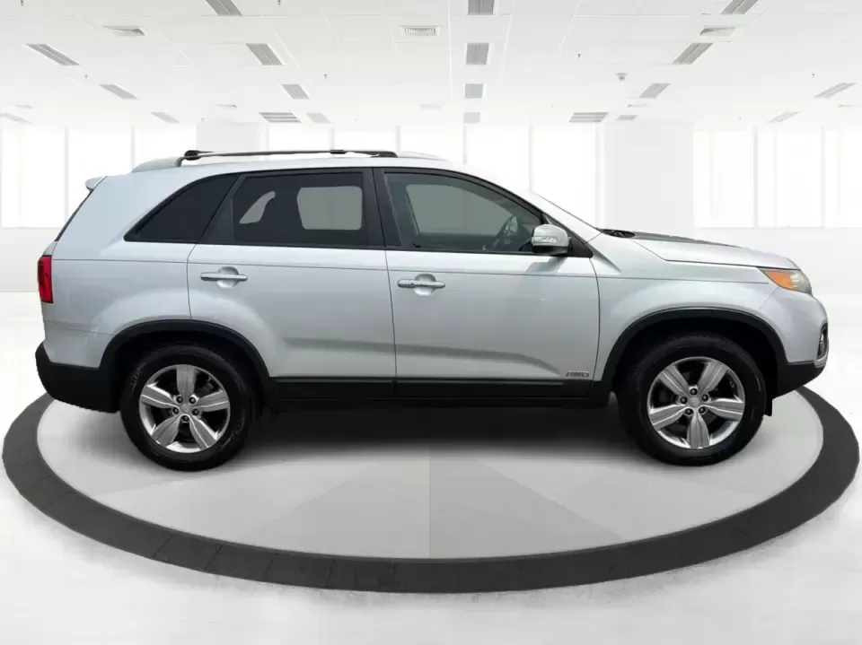 2012 Kia Sorento EX 4WD (5XYKUCA68CG) with an 2.4L L4 DOHC 16V engine, 6-Speed Automatic transmission, located at 1099 N County Rd 25A , Troy, OH, 45373, (937) 908-9800, 40.057079, -84.212883 - Weekend escapes to Caesar Creek, snowy school-drop mornings, and everyday errands up and down I75 feel a lot easier when you've got a comfortable SUV with real all-weather capability. This 2012 Kia Sorento EX 4WD is a smart pick for Troy drivers who want a practical, family-friendly ride that's equa- Photo#1