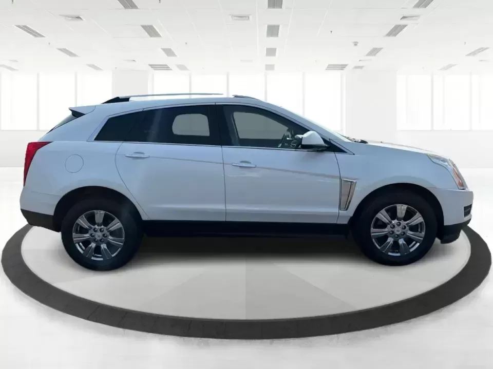 2015 Cadillac SRX Luxury Collection FWD (3GYFNBE33FS) with an 3.6L V6 DOHC 24V FFV engine, 6-Speed Automatic transmission, located at 8750 N County Rd 25A, Piqua, OH, 45356, (937) 908-9800, 40.164391, -84.232513 - Upgrade your daily drive with a luxury SUV that fits real life-school drop-offs, long commutes to Dayton, and comfortable weekend getaways up I75. This 2015 Cadillac SRX Luxury Collection FWD blends upscale style with practical space for five, making it a smart pick for growing families, busy profes- Photo#1