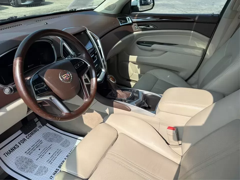 2015 Cadillac SRX Luxury Collection FWD (3GYFNBE33FS) with an 3.6L V6 DOHC 24V FFV engine, 6-Speed Automatic transmission, located at 8750 N County Rd 25A, Piqua, OH, 45356, (937) 908-9800, 40.164391, -84.232513 - Upgrade your daily drive with a luxury SUV that fits real life-school drop-offs, long commutes to Dayton, and comfortable weekend getaways up I75. This 2015 Cadillac SRX Luxury Collection FWD blends upscale style with practical space for five, making it a smart pick for growing families, busy profes- Photo#9