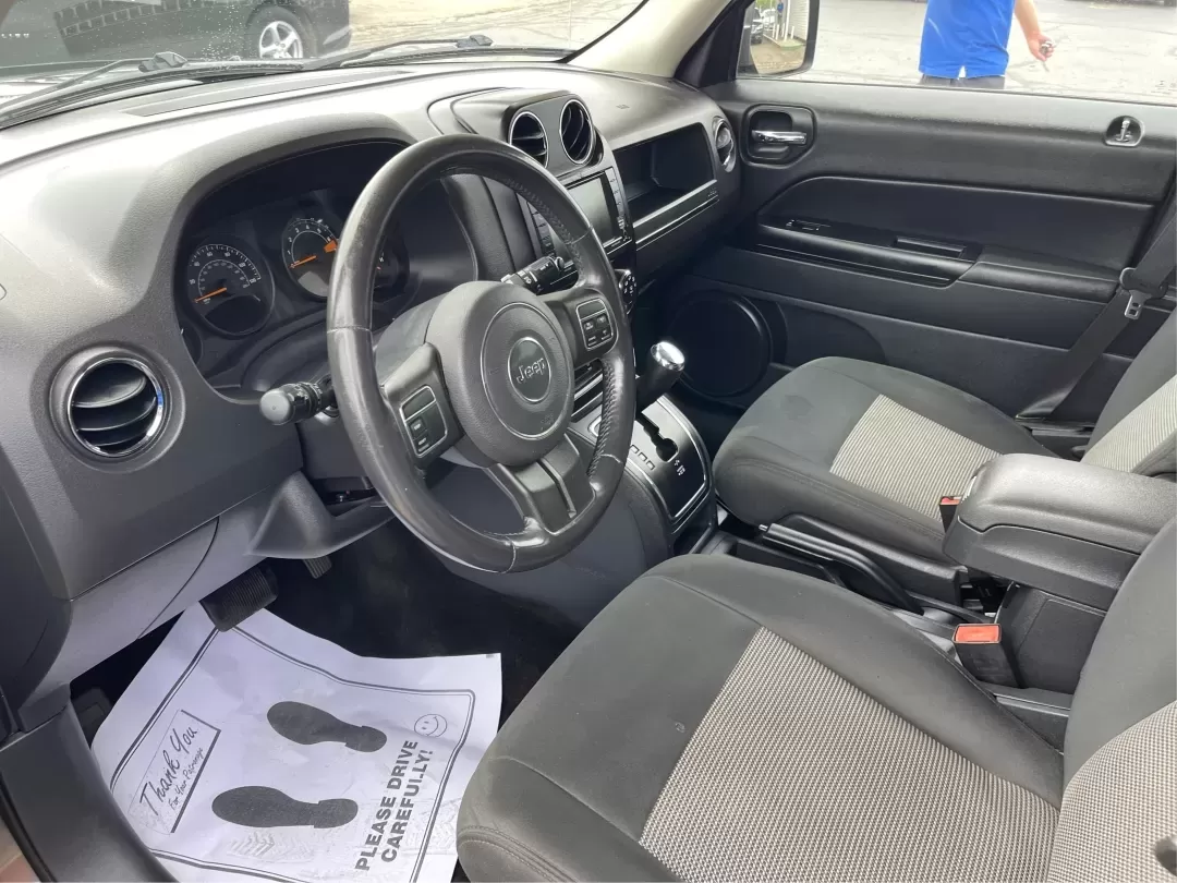 2014 Jeep Patriot Latitude 4WD (1C4NJRFB5ED) with an 2.4L L4 DOHC 16V engine, located at 1230 East Main St, Xenia, OH, 45385, (937) 908-9800, 39.688026, -83.910172 - **Adventure Awaits with the 2014 Jeep Patriot Latitude 4WD!**<br /> <br /> If you're longing for a vehicle that blends rugged capability with everyday comfort, look no further than the 2014 Jeep Patriot Latitude 4WD. Perfect for weekend adventures or daily commutes, this SUV is designed to take you - Photo#2