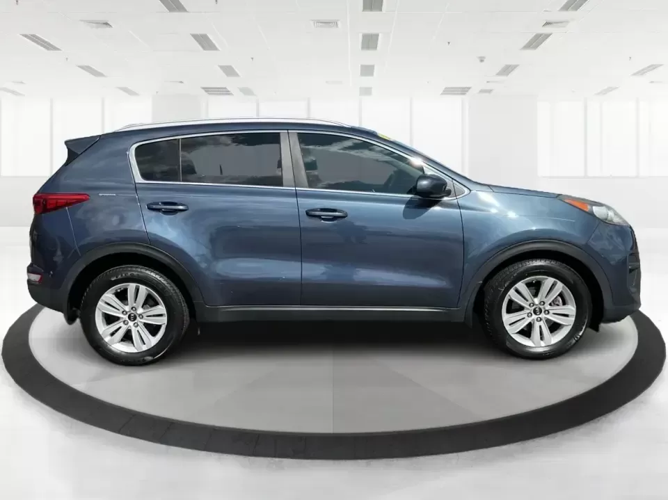 2017 Kia Sportage LX FWD (KNDPM3ACXH7) with an 2.4L V6 DOHC 24V engine, 6A transmission, located at 1230 East Main St, Xenia, OH, 45385, (937) 908-9800, 39.688026, -83.910172 - Picture your next week: an easy school drop-off, a smooth commute down US-35, and a Saturday escape to Caesar Creek State Park with room for everyone and everything. This 2017 Kia Sportage LX FWD in eye-catching Pacific Blue is the kind of practical, comfortable crossover that fits real life in Xeni- Photo#1