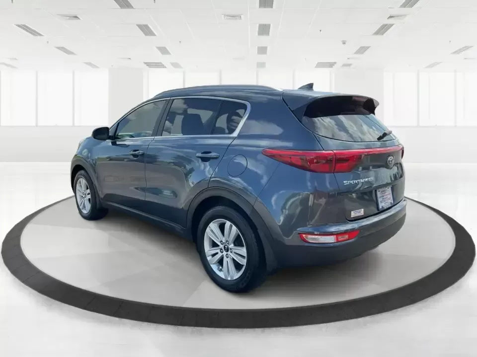 2017 Kia Sportage LX FWD (KNDPM3ACXH7) with an 2.4L V6 DOHC 24V engine, 6A transmission, located at 1230 East Main St, Xenia, OH, 45385, (937) 908-9800, 39.688026, -83.910172 - Picture your next week: an easy school drop-off, a smooth commute down US-35, and a Saturday escape to Caesar Creek State Park with room for everyone and everything. This 2017 Kia Sportage LX FWD in eye-catching Pacific Blue is the kind of practical, comfortable crossover that fits real life in Xeni- Photo#4
