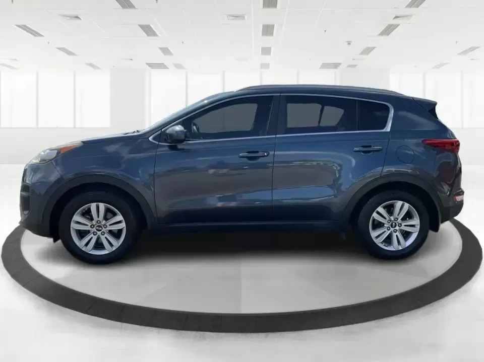 2017 Kia Sportage LX FWD (KNDPM3ACXH7) with an 2.4L V6 DOHC 24V engine, 6A transmission, located at 1230 East Main St, Xenia, OH, 45385, (937) 908-9800, 39.688026, -83.910172 - Picture your next week: an easy school drop-off, a smooth commute down US-35, and a Saturday escape to Caesar Creek State Park with room for everyone and everything. This 2017 Kia Sportage LX FWD in eye-catching Pacific Blue is the kind of practical, comfortable crossover that fits real life in Xeni- Photo#5