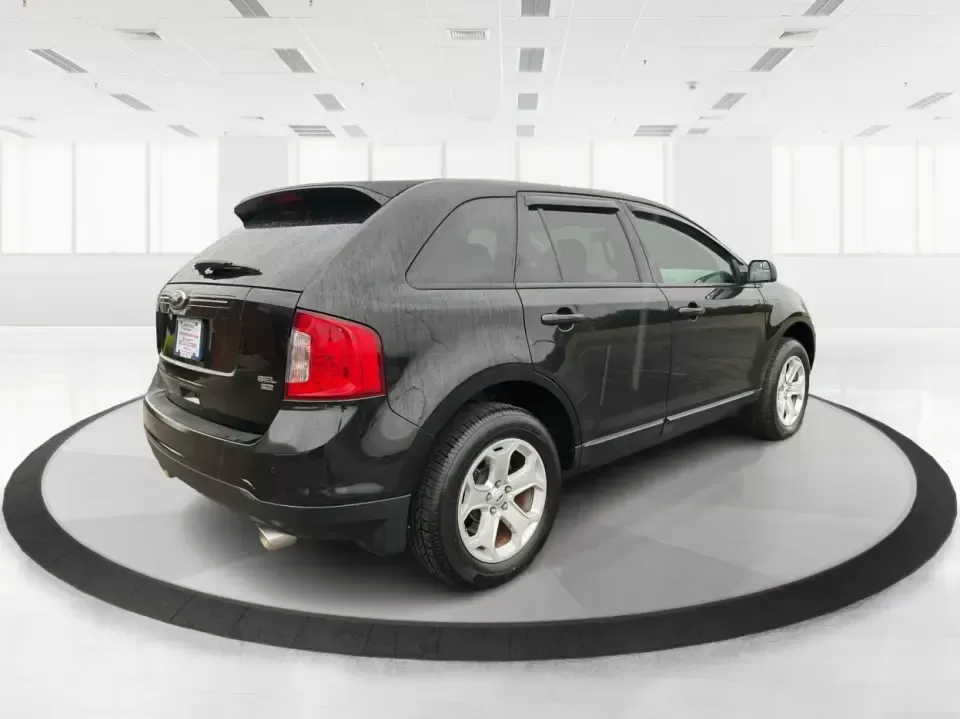 2013 Ford Edge SEL (2FMDK4JC1DB) with an 3.5L V-6 DOHC engine, 6-Speed Automatic transmission, located at 4508 South Dixie Dr, Moraine, OH, 45439, (937) 908-9800, 39.689976, -84.218452 - **Elevate Your Weekend Adventures with the 2013 Ford Edge SEL at Advantage Car and Credit!**<br /> <br /> Are you ready to embrace a lifestyle of comfort and adventure? Whether you're shuttling the kids to their weekend soccer games or embarking on a scenic road trip through Ohio's beautiful landsca - Photo#2