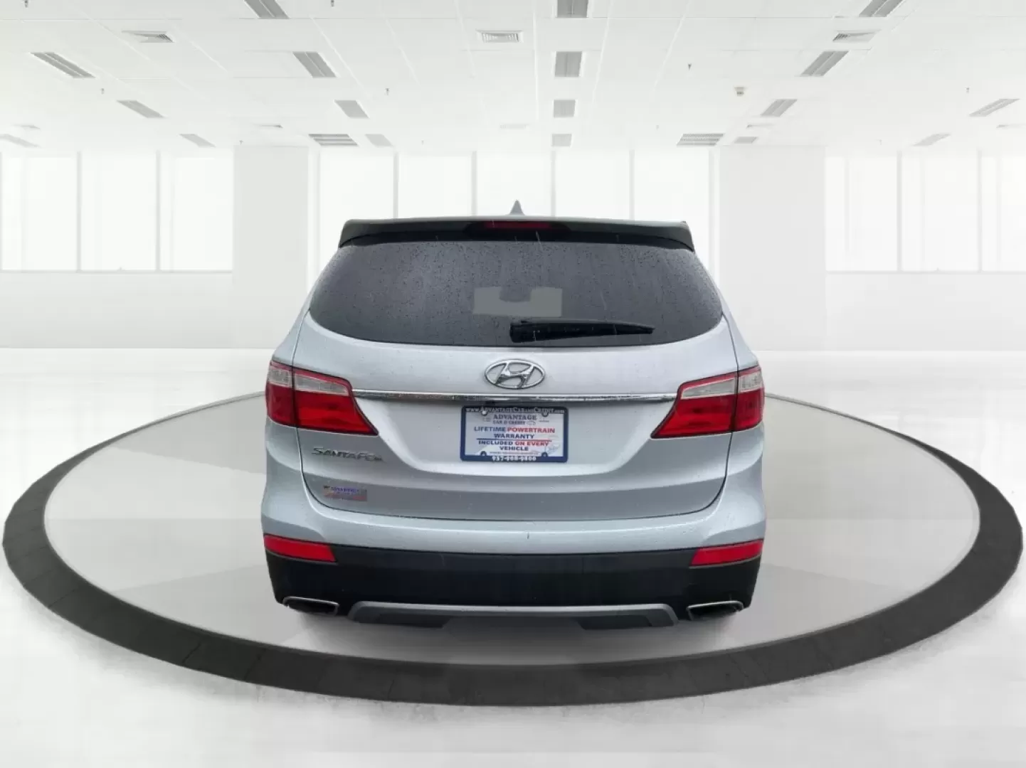 2014 Hyundai Santa Fe GLS (KM8SM4HF5EU) with an Lambda II 3.3L V-6 gasoline direct injection engine, located at 8750 N County Rd 25A, Piqua, OH, 45356, (937) 908-9800, 40.164391, -84.232513 - Looking for the perfect SUV to complement your busy lifestyle? Look no further than the 2014 Hyundai Santa Fe GLS, a vehicle designed for families, adventurers, and commuters alike. This reliable SUV, available at Advantage Car and Credit in Fairborn, OH, provides ample space, comfort, and modern fe - Photo#3