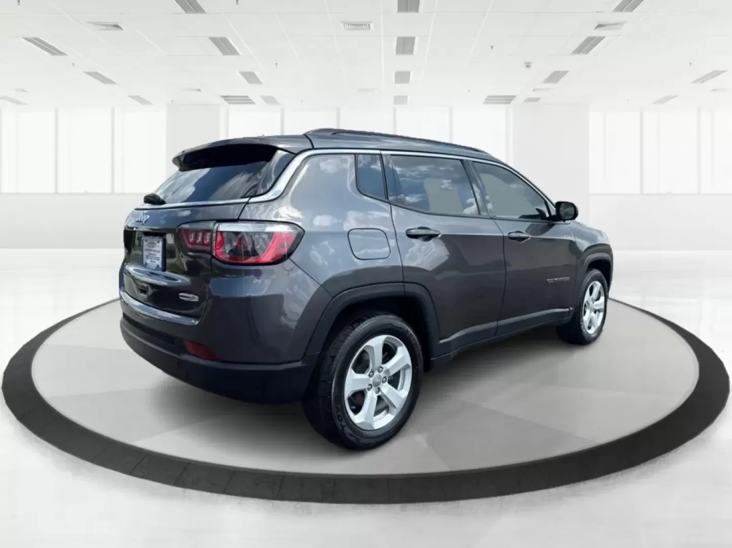 2018 Jeep Compass Latitude FWD (3C4NJCBB1JT) with an 2.4L I-4 variable valve control engine, located at 8750 N County Rd 25A, Piqua, OH, 45356, (937) 908-9800, 40.164391, -84.232513 - **Adventure Awaits with This 2018 Jeep Compass Latitude FWD!**<br /> <br /> Transform your everyday travels into unforgettable adventures with the 2018 Jeep Compass Latitude FWD. This SUV is not just a mode of transportation; it's your ticket to exploration, whether it's cruising through the scenic - Photo#2