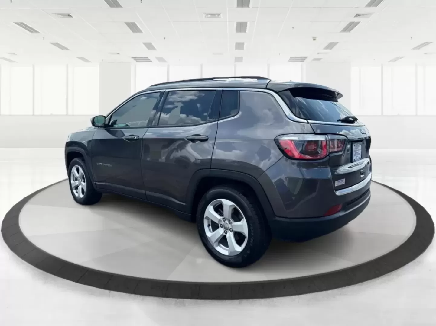 2018 Jeep Compass Latitude FWD (3C4NJCBB1JT) with an 2.4L I-4 variable valve control engine, located at 8750 N County Rd 25A, Piqua, OH, 45356, (937) 908-9800, 40.164391, -84.232513 - **Adventure Awaits with This 2018 Jeep Compass Latitude FWD!**<br /> <br /> Transform your everyday travels into unforgettable adventures with the 2018 Jeep Compass Latitude FWD. This SUV is not just a mode of transportation; it's your ticket to exploration, whether it's cruising through the scenic - Photo#4