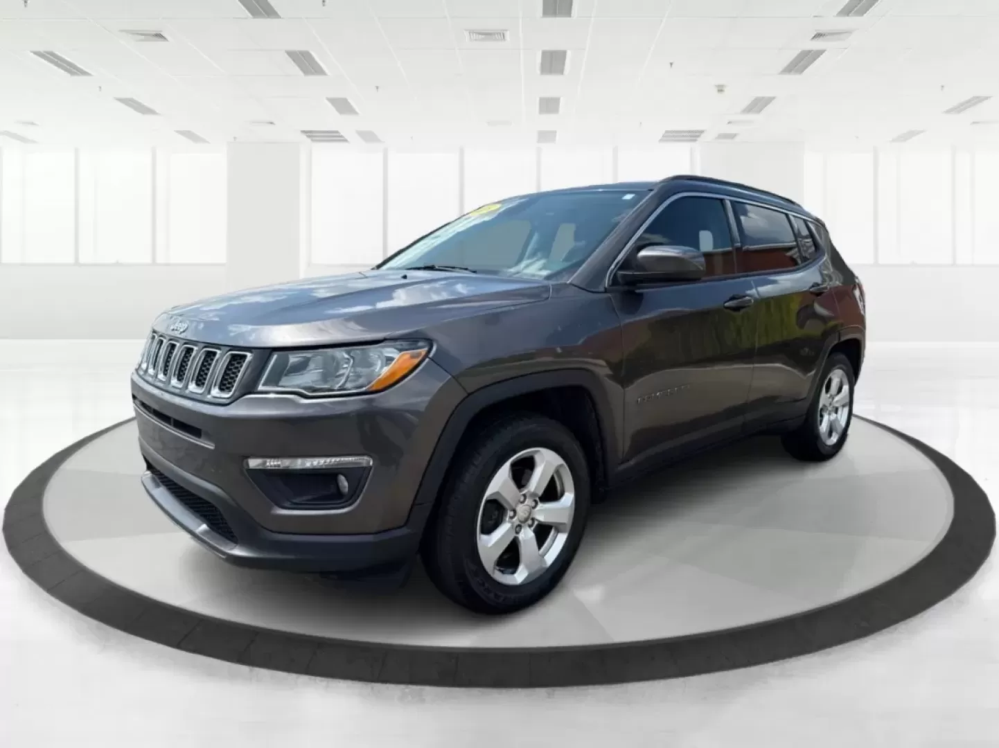 2018 Jeep Compass Latitude FWD (3C4NJCBB1JT) with an 2.4L I-4 variable valve control engine, located at 8750 N County Rd 25A, Piqua, OH, 45356, (937) 908-9800, 40.164391, -84.232513 - **Adventure Awaits with This 2018 Jeep Compass Latitude FWD!**<br /> <br /> Transform your everyday travels into unforgettable adventures with the 2018 Jeep Compass Latitude FWD. This SUV is not just a mode of transportation; it's your ticket to exploration, whether it's cruising through the scenic - Photo#8