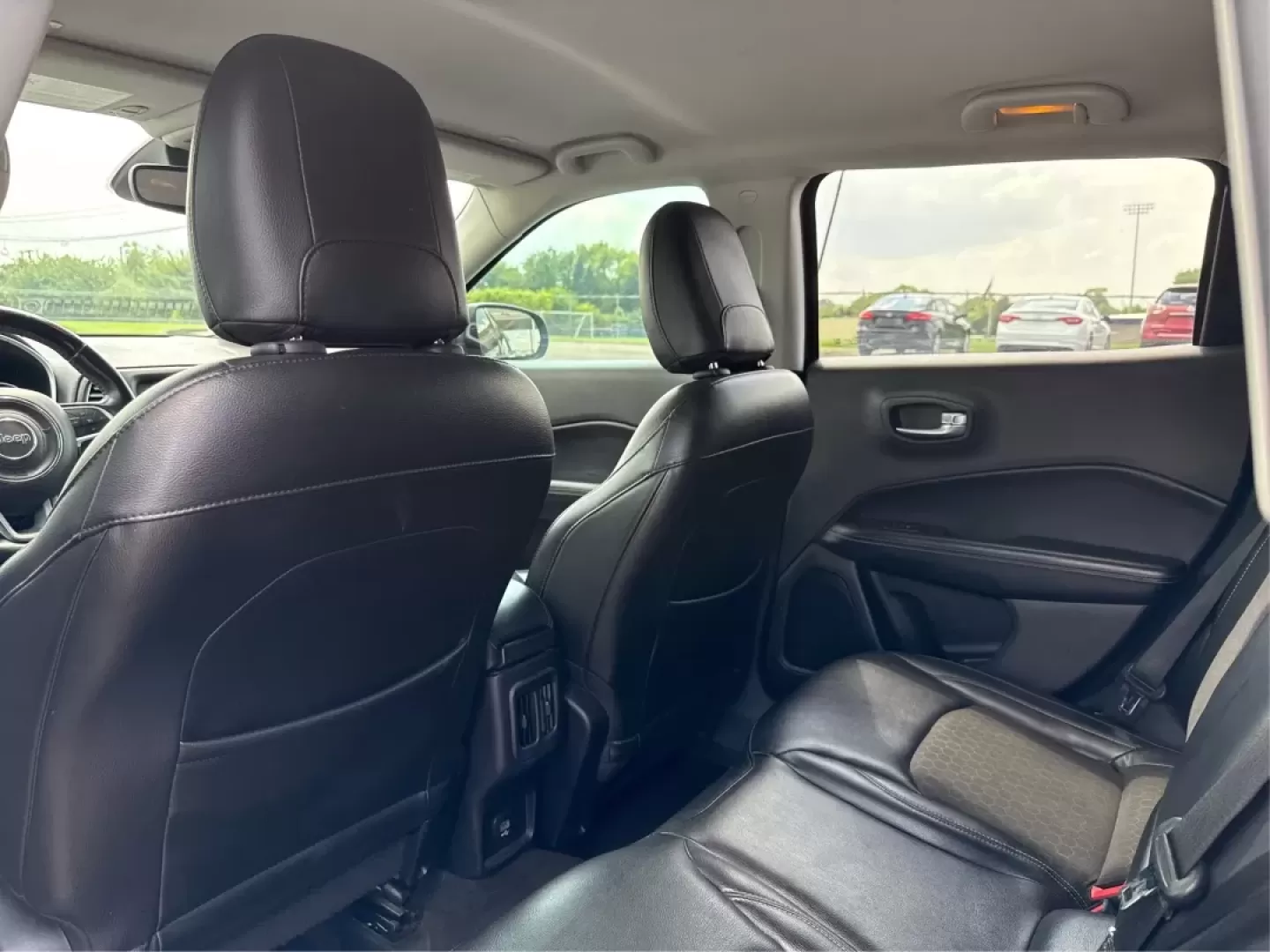 2018 Jeep Compass Latitude FWD (3C4NJCBB1JT) with an 2.4L I-4 variable valve control engine, located at 8750 N County Rd 25A, Piqua, OH, 45356, (937) 908-9800, 40.164391, -84.232513 - **Adventure Awaits with This 2018 Jeep Compass Latitude FWD!**<br /> <br /> Transform your everyday travels into unforgettable adventures with the 2018 Jeep Compass Latitude FWD. This SUV is not just a mode of transportation; it's your ticket to exploration, whether it's cruising through the scenic - Photo#10