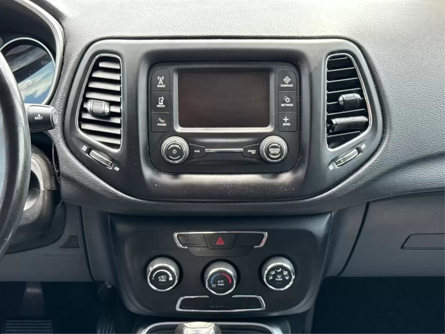 2018 Jeep Compass Latitude FWD (3C4NJCBB1JT) with an 2.4L I-4 variable valve control engine, located at 8750 N County Rd 25A, Piqua, OH, 45356, (937) 908-9800, 40.164391, -84.232513 - **Adventure Awaits with This 2018 Jeep Compass Latitude FWD!**<br /> <br /> Transform your everyday travels into unforgettable adventures with the 2018 Jeep Compass Latitude FWD. This SUV is not just a mode of transportation; it's your ticket to exploration, whether it's cruising through the scenic - Photo#13