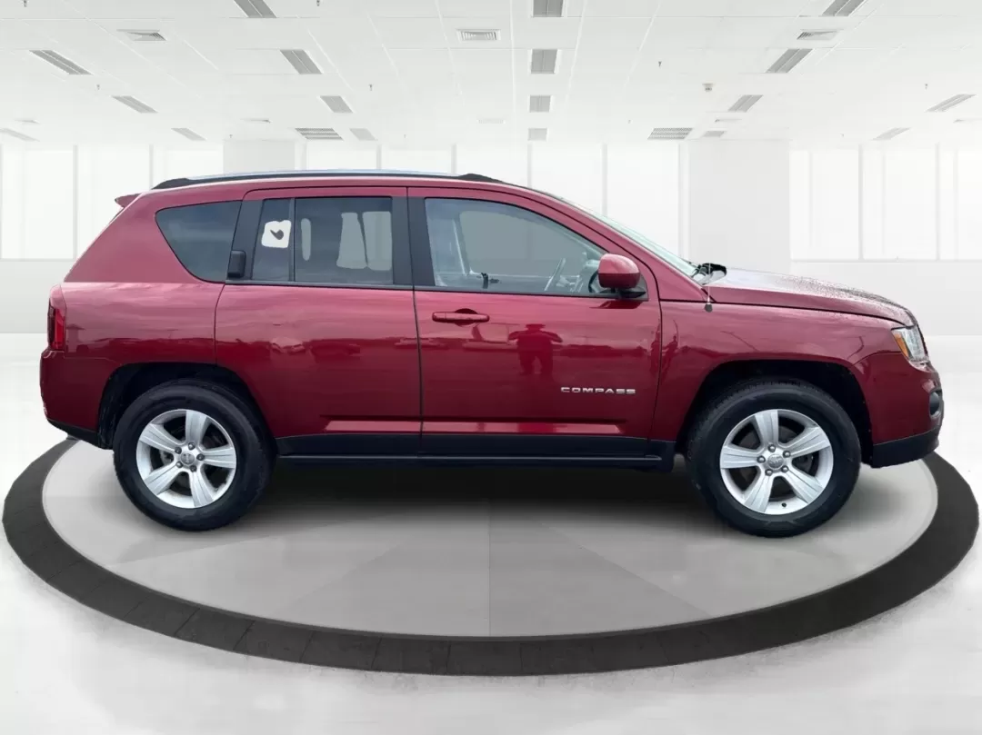 2014 Jeep Compass Latitude (1C4NJDEBXED) with an 2.4L I-4 DOHC engine, located at 401 Woodman Dr, Riverside, OH, 45431, (937) 908-9800, 39.760899, -84.123421 - 2014 Jeep Compass Latitude - Photo#1