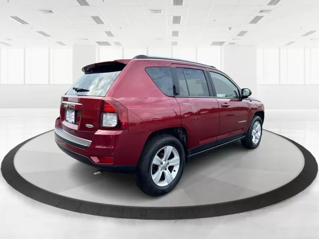 2014 Jeep Compass Latitude (1C4NJDEBXED) with an 2.4L I-4 DOHC engine, located at 401 Woodman Dr, Riverside, OH, 45431, (937) 908-9800, 39.760899, -84.123421 - 2014 Jeep Compass Latitude - Photo#2