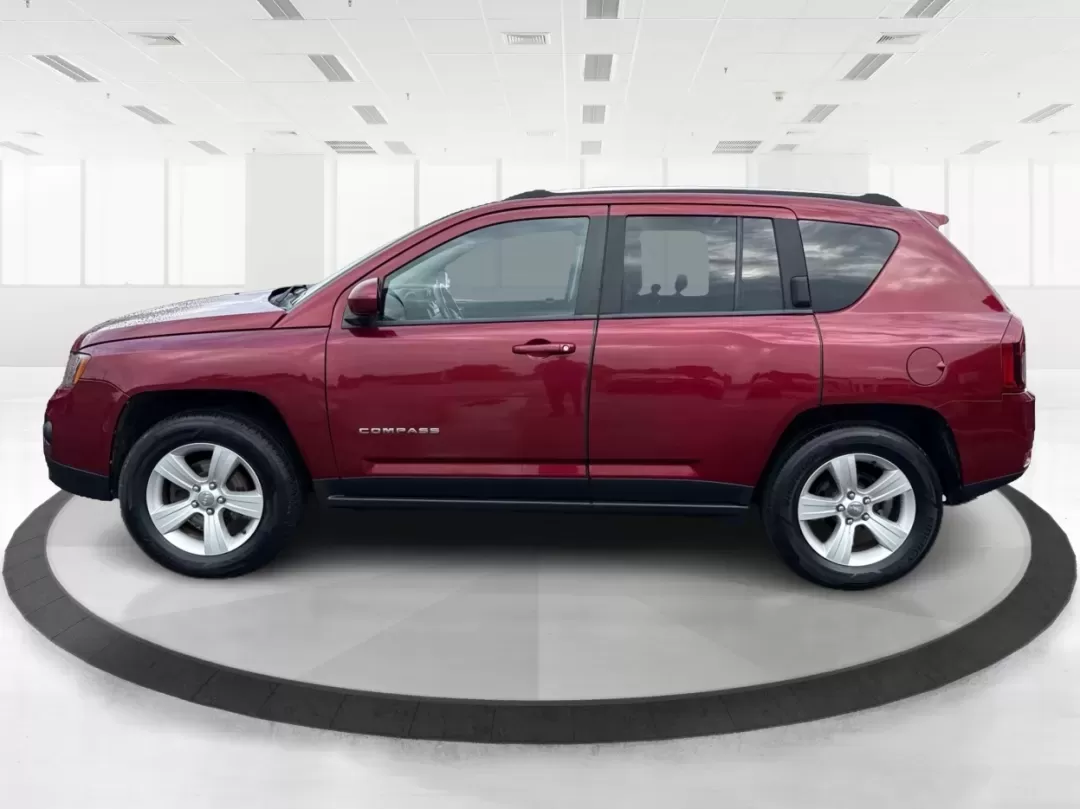 2014 Jeep Compass Latitude (1C4NJDEBXED) with an 2.4L I-4 DOHC engine, located at 401 Woodman Dr, Riverside, OH, 45431, (937) 908-9800, 39.760899, -84.123421 - 2014 Jeep Compass Latitude - Photo#5