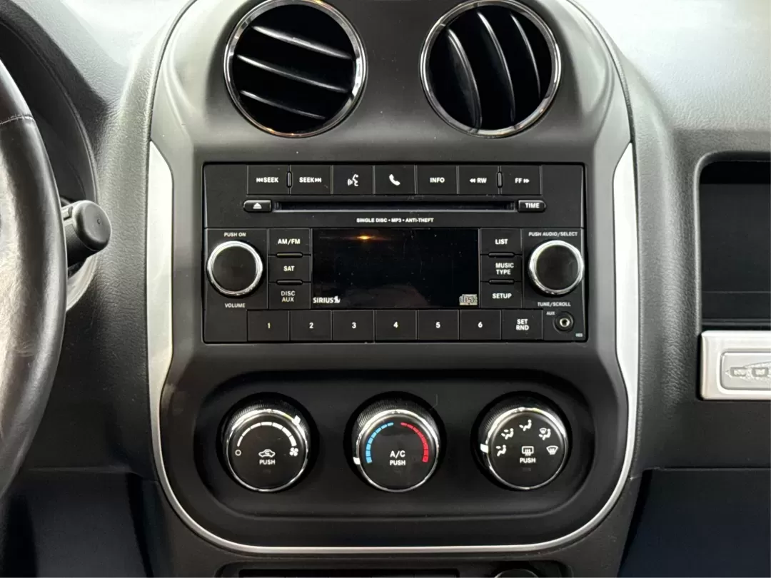 2014 Jeep Compass Latitude (1C4NJDEBXED) with an 2.4L I-4 DOHC engine, located at 401 Woodman Dr, Riverside, OH, 45431, (937) 908-9800, 39.760899, -84.123421 - 2014 Jeep Compass Latitude - Photo#13