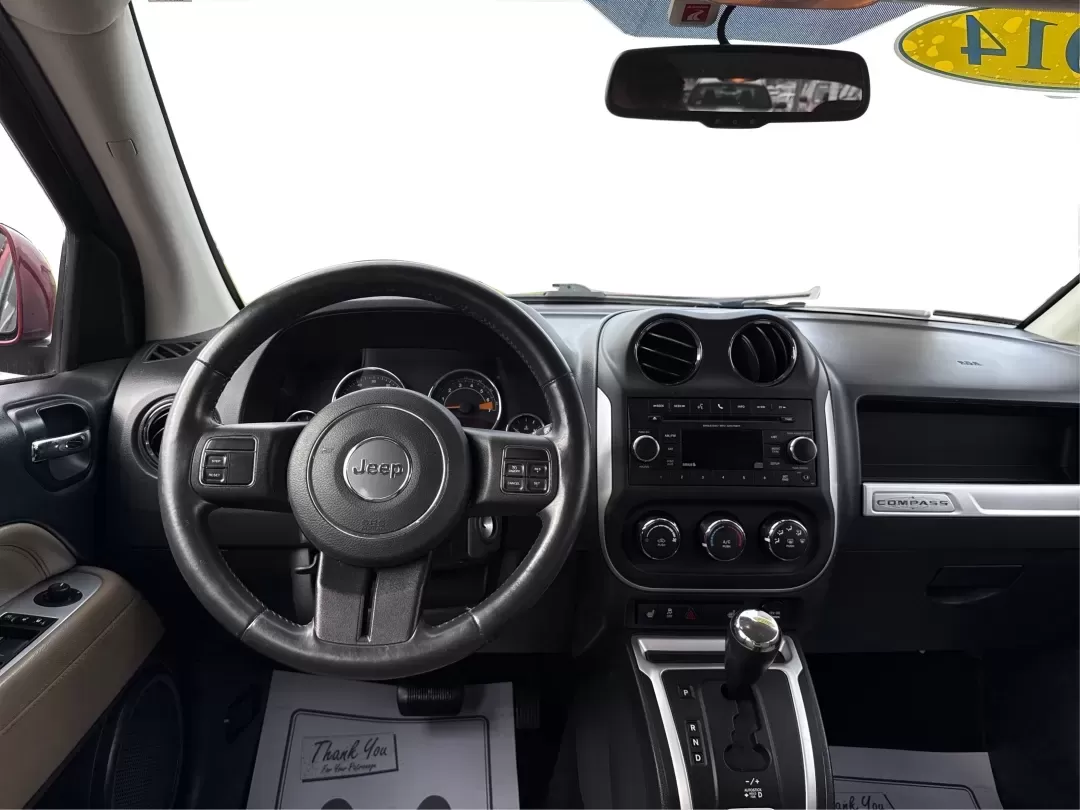 2014 Jeep Compass Latitude (1C4NJDEBXED) with an 2.4L I-4 DOHC engine, located at 401 Woodman Dr, Riverside, OH, 45431, (937) 908-9800, 39.760899, -84.123421 - 2014 Jeep Compass Latitude - Photo#21