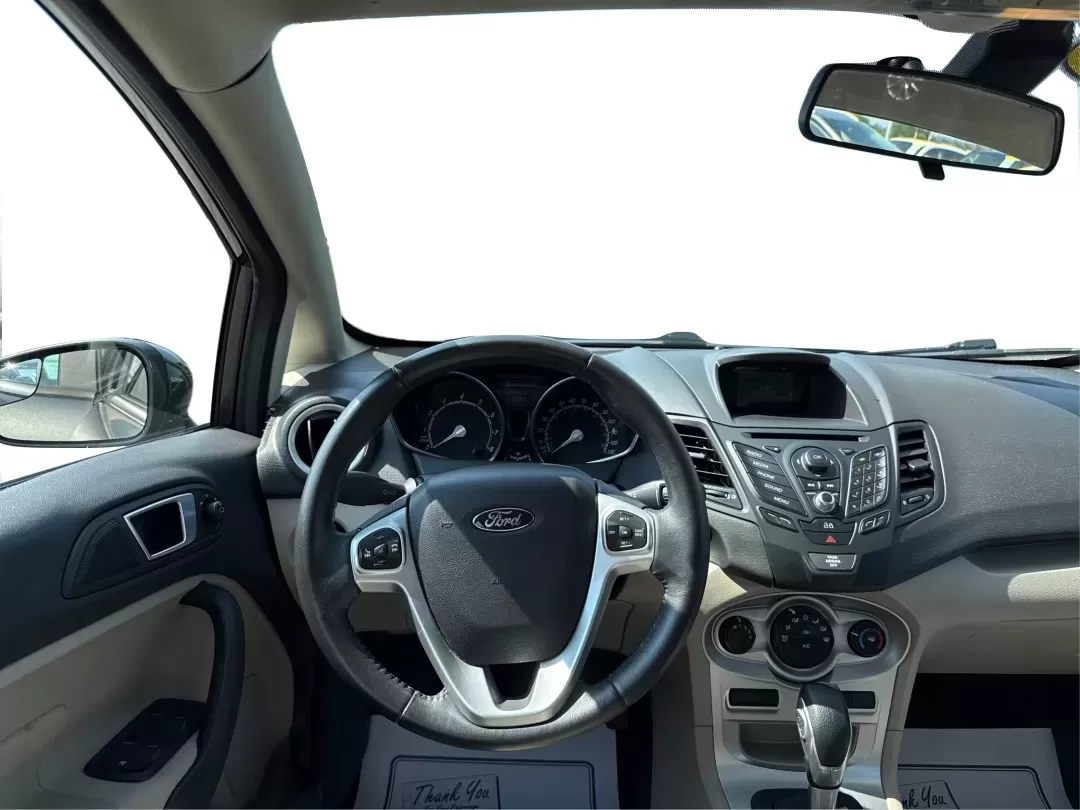 2015 Ford Fiesta SE (3FADP4BJ4FM) with an EcoBoost 1L I-3 gasoline direct injection engine, located at 1230 East Main St, Xenia, OH, 45385, (937) 908-9800, 39.688026, -83.910172 - **Discover Adventure and Style with the 2015 Ford Fiesta SE at Advantage Car and Credit in Fairborn, OH!**<br /> <br /> Are you ready to elevate your daily commute or weekend adventures? The 2015 Ford Fiesta SE is the ideal sedan for budget-conscious buyers seeking a reliable and stylish companion. - Photo#21