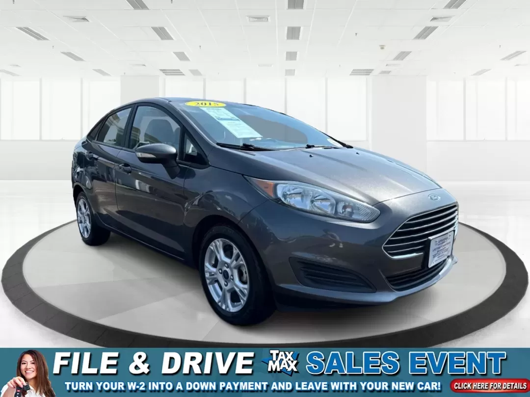 2015 Ford Fiesta SE (3FADP4BJ4FM) with an EcoBoost 1L I-3 gasoline direct injection engine, located at 8750 N County Rd 25A, Piqua, OH, 45356, (937) 908-9800, 40.164391, -84.232513 - **Discover Adventure and Style with the 2015 Ford Fiesta SE at Advantage Car and Credit in Fairborn, OH!**<br /> <br /> Are you ready to elevate your daily commute or weekend adventures? The 2015 Ford Fiesta SE is the ideal sedan for budget-conscious buyers seeking a reliable and stylish companion. - Photo#0