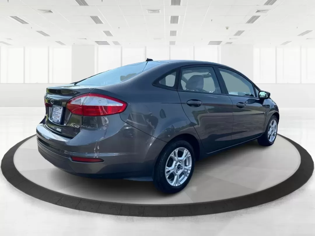 2015 Ford Fiesta SE (3FADP4BJ4FM) with an EcoBoost 1L I-3 gasoline direct injection engine, located at 8750 N County Rd 25A, Piqua, OH, 45356, (937) 908-9800, 40.164391, -84.232513 - **Discover Adventure and Style with the 2015 Ford Fiesta SE at Advantage Car and Credit in Fairborn, OH!**<br /> <br /> Are you ready to elevate your daily commute or weekend adventures? The 2015 Ford Fiesta SE is the ideal sedan for budget-conscious buyers seeking a reliable and stylish companion. - Photo#2