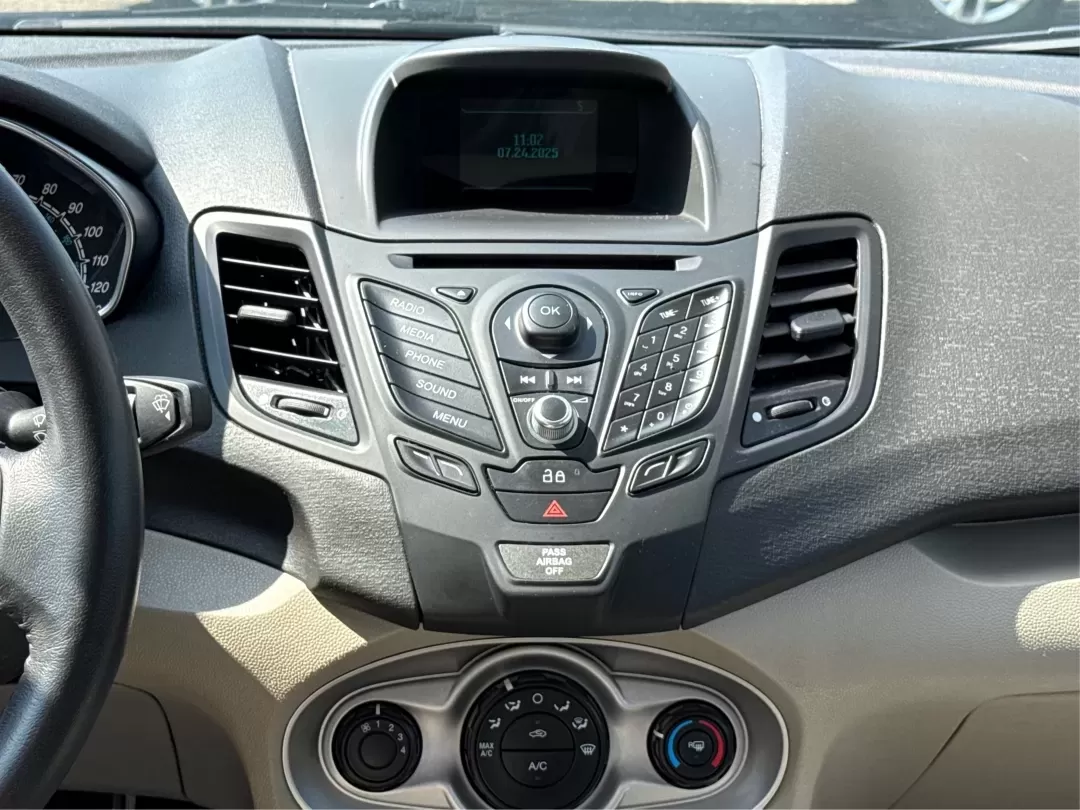 2015 Ford Fiesta SE (3FADP4BJ4FM) with an EcoBoost 1L I-3 gasoline direct injection engine, located at 8750 N County Rd 25A, Piqua, OH, 45356, (937) 908-9800, 40.164391, -84.232513 - **Discover Adventure and Style with the 2015 Ford Fiesta SE at Advantage Car and Credit in Fairborn, OH!**<br /> <br /> Are you ready to elevate your daily commute or weekend adventures? The 2015 Ford Fiesta SE is the ideal sedan for budget-conscious buyers seeking a reliable and stylish companion. - Photo#13