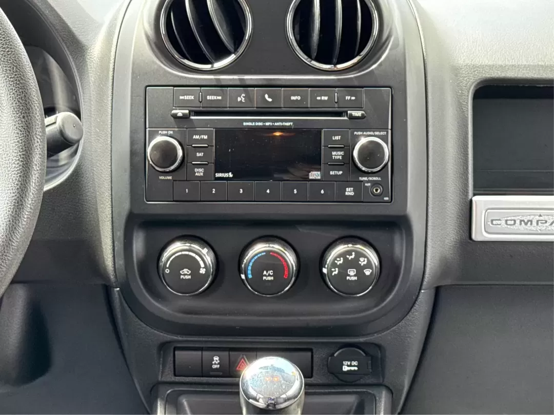 2014 Jeep Compass Sport (1C4NJDBB4ED) with an 2.4L I-4 DOHC engine, located at 1230 East Main St, Xenia, OH, 45385, (937) 908-9800, 39.688026, -83.910172 - **Experience Adventure with the 2014 Jeep Compass Sport at Advantage Car and Credit Xenia!** <br /> <br /> Are you ready to embrace the open road with a vehicle that combines comfort, capability, and style? The 2014 Jeep Compass Sport, available at Advantage Car and Credit in Xenia, Ohio, is the pe - Photo#13