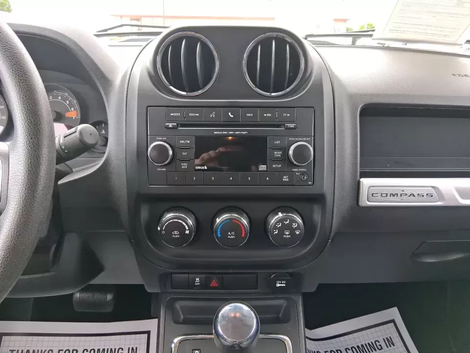 2014 Jeep Compass Sport (1C4NJDBB4ED) with an 2.4L I-4 DOHC engine, Automatic transmission, located at 1230 East Main St, Xenia, OH, 45385, (937) 908-9800, 39.688026, -83.910172 - **Experience Adventure with the 2014 Jeep Compass Sport at Advantage Car and Credit Xenia!** <br /> <br /> Are you ready to embrace the open road with a vehicle that combines comfort, capability, and style? The 2014 Jeep Compass Sport, available at Advantage Car and Credit in Xenia, Ohio, is the pe - Photo#13